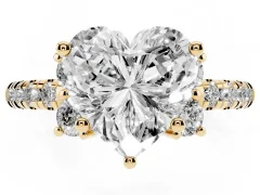 Heart Cut Diamond Three-Stone Pavé Ring Set in Yellow gold with Prong Setting