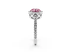 Fancy Pink Round Cut Diamond Halo Ring Set in Platinum with Pavé Shoulders and Halo-Framed Center
