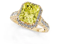 Fancy Yellow Radiant Cut Diamond Halo Engagement Ring Set in Yellow gold with Pavé Band and Prong-Set Center