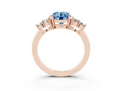 Fancy Blue Round Cut Diamond Solitaire Ring Set in Rose gold with Cluster Accents on Each Side