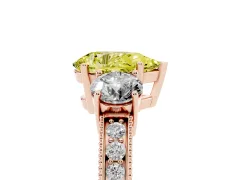 Fancy Yellow Pear Cut Diamond Three-Stone Ring Set in Rose gold with Round Side Stones and Pavé Band