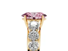 Fancy Pink Oval Cut Diamond Solitaire Ring Set in Yellow gold with Pavé-Set Band and Prong Setting