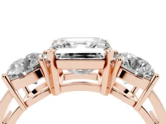 Asscher Cut Diamond Three-Stone Ring Set in Rose gold with Round Side Stones and Classic Band