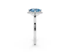 Fancy Blue Princess Cut Diamond Halo Engagement Ring Set in White gold with Pavé Band and Rising Shoulders