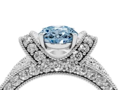 Fancy Blue Oval Cut Diamond Milgrain Halo Pavé Engagement Ring Set in Platinum with Prong Setting