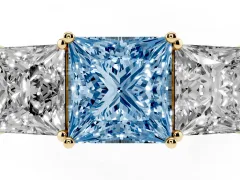 Fancy Blue Princess Cut Diamond Three-Stone Ring Set in Yellow gold with Textured Band