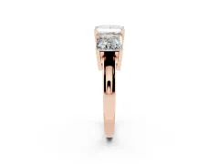 Princess Cut Diamond Three-Stone Ring Set in Rose gold with Channel-Set Band and Prong Settings