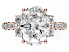 Oval Cut Diamond Three-Stone Pavé Ring Set in Rose gold with Prong Setting