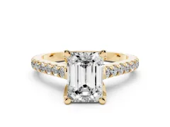 Emerald Cut Diamond Solitaire Ring Set in Yellow gold with Brilliant Pavé Band and Prong Setting