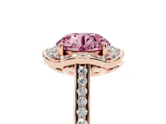 Fancy Pink Round Cut Diamond Halo Ring Set in Rose gold with Pavé-Lined Shoulders and Prong Setting