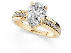 Pear Cut Diamond Solitaire Ring Set in Yellow gold with Channel Set Band and Prong Setting