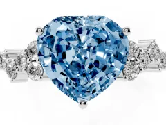 Fancy Blue Heart Cut Diamond Ring Set in Silver with Scattered Round Accents