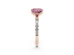 Fancy Pink Radiant Cut Diamond Solitaire Engagement Ring Set in Rose gold with Round Pavé Band and Prong Setting