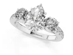 Pear Cut Diamond Three-Stone Ring Set in Platinum with Round Side Stones and Delicate Pavé Band