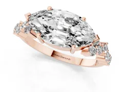 Marquise Cut Diamond Ring Set in Rose gold with Scattered Round Accents
