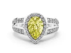 Fancy Yellow Pear Cut Diamond Halo Ring Set in Platinum with Double Pavé Split Shank