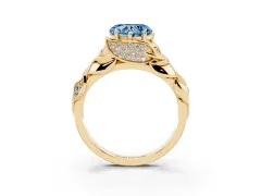 Fancy Blue Heart Cut Diamond Leaf-Inspired Engagement Ring Set in Yellow gold with Round Accents