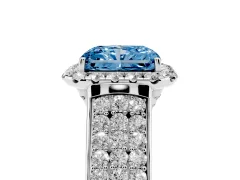 Fancy Blue Radiant Cut Diamond Halo Ring Set in White gold with Pavé Band and Raised Center Setting