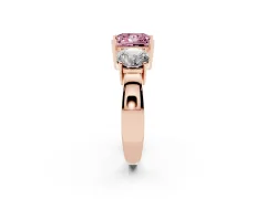 Fancy Pink Princess Cut Diamond Three-Stone Ring Set in Rose gold with Round Side Stones and Classic Band