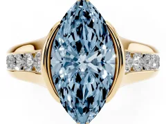 Fancy Blue Marquise Cut Diamond Bezel-Set Solitaire Ring Set in Yellow gold with Channel-Set Band