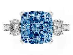 Fancy Blue Cushion Cut Diamond Three-Stone Ring Set in Platinum with Pavé Band and Smaller Side Stones