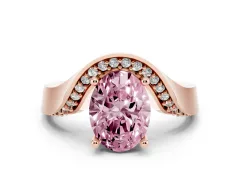 Fancy Pink Oval Cut Diamond Solitaire Engagement Ring Set in Rose gold with Pavé Shoulders