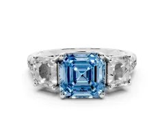 Fancy Blue Asscher Cut Diamond Three-Stone Ring Set in White gold with Pavé Band