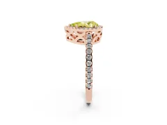 Fancy Yellow Pear Cut Diamond Halo Ring Set in Rose gold with Pavé Shoulders and Halo-Framed Center