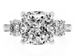 Cushion Cut Diamond Three-Stone Ring Set in White gold with Pavé Band and Smaller Side Stones