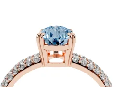 Fancy Blue Pear Cut Diamond Solitaire Ring Set in Rose gold with Multi-Row Round Pavé Band and Prong Setting