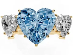 Fancy Blue Heart Cut Diamond Three-Stone Ring Set in Yellow gold with Braided Band
