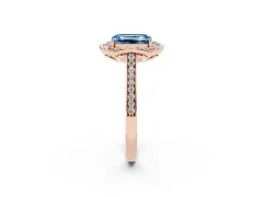 Fancy Blue Emerald Cut Diamond Halo Ring Set in Rose gold with Pavé-Lined Shoulders and Prong Setting