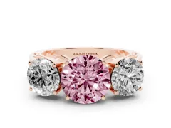 Fancy Pink Round Cut Diamond Three-Stone Ring Set in Rose gold with Textured Band