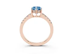 Fancy Blue Cushion Cut Diamond Solitaire Engagement Ring Set in Rose gold with Pavé Band and Prong Setting