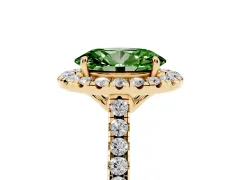 Fancy Green Oval Cut Diamond Pavé Halo Engagement Ring Set in Yellow gold with Pavé Band and Prong Setting