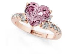 Fancy Pink Heart Cut Diamond Three-Stone Pavé Ring Set in Rose gold with Prong Setting