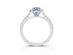 Fancy Blue Emerald Cut Diamond Solitaire Ring Set in Silver with Pavé Band and Floral Prong Setting