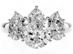 Pear Cut Diamond Three-Stone Ring Set in Platinum with Bold Center and Classic Band