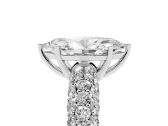 Marquise Cut Diamond Pavé Band Solitaire Ring Set in White gold with Close-Set Accent Stones and Prong Setting