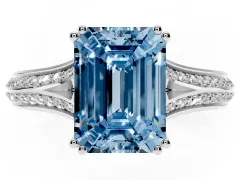 Fancy Blue Emerald Cut Diamond Split Shank Pavé Engagement Ring Set in White gold with Prong-Set Center Stone