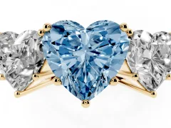 Fancy Blue Heart Cut Diamond Three-Stone Ring Set in Yellow gold with Textured Band