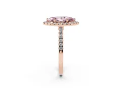 Fancy Pink Marquise Cut Diamond Halo Pavé Engagement Ring Set in Rose gold with Prong Setting