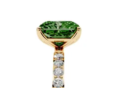 Fancy Green Radiant Cut Diamond Solitaire Engagement Ring Set in Yellow gold with Round Pavé Band and Prong Setting