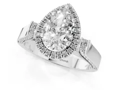 Pear Cut Diamond Halo Ring Set in Platinum with Pavé-Lined Split Shank Band