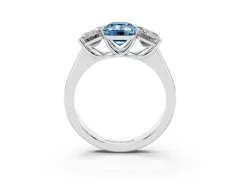 Fancy Blue Emerald Cut Diamond Three-Stone Ring Set in White gold with Plain Polished Band