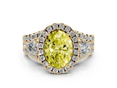 Fancy Yellow Oval Cut Diamond Halo Split Shank Ring Set in Yellow gold with Round Accent Stones and Prong Setting