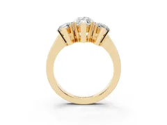 Marquise Cut Diamond Three-Stone Ring Set in Yellow gold with Channel-Set Band and Prong Settings