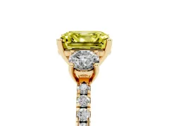 Fancy Yellow Asscher Cut Diamond Three-Stone Ring Set in Yellow gold with Pavé Band and Graduated Sides