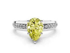 Fancy Yellow Pear Cut Diamond Solitaire Ring Set in Silver with Channel Set Band and Prong Setting