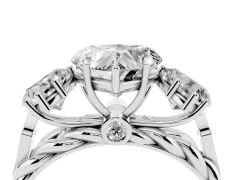 Heart Cut Diamond Three-Stone Ring Set in Platinum with Braided Band